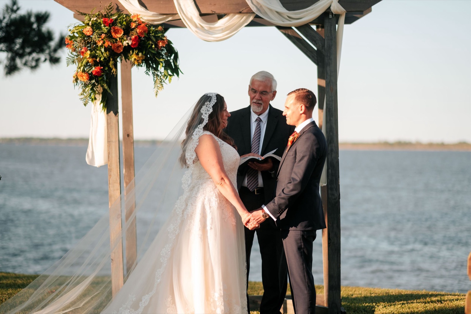 The waterfront wedding ceremony at Copper on the Neuse in New Bern